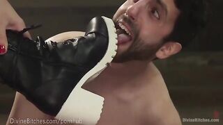 The strong dominatrix beats and dominates her slaveboy in a wrestling match