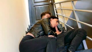 A couple gets naughty on the stairs of their apartment, getting caught