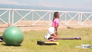 A sexy Peruvian woman is doing exercises in front of the camera
