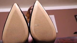 A sexy secretary is being bullied by her strict boss in a steamy scene