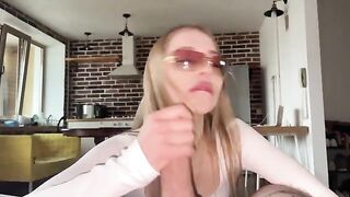 Pretty woman in glasses fucks with her boyfriend, gets cum on her face