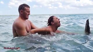 A hot chick is having sensual sex right in the ocean, it’s really amazing!