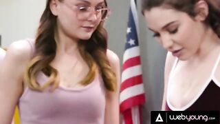 Two girls are experimenting with their bodies in detention