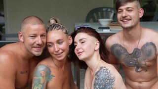 Amateur foursome with two couples enjoying real swinging action