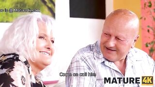 The guy fucked a mature woman on the table in front of her husband