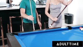 Roommates Paige Owens and Kay Lovely use a stud for a game