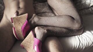 A sexy girl in high heels and pantyhose is always ready for footjob