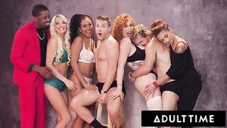 The sexy girls are having fun with the guys in an awesome Christmas party