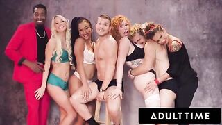 The sexy girls are having fun with the guys in an awesome Christmas party