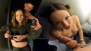 A brunette has sex in the dressing room of the shopping mall