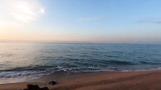 A girl is fucking on the beach and gets caught in a compromising pose