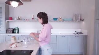 I cook and undress at a friend's house in a steamy kitchen scene