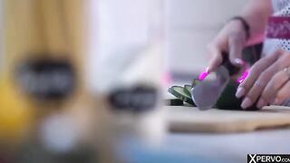 A mistress plays a game of dominance in the kitchen with her partner