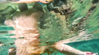 Babe has sex with a guy right in the water, showcasing her wild side