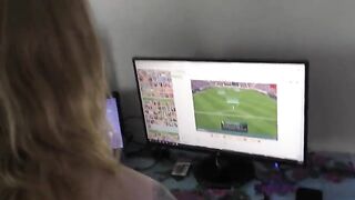 A young girl was playing video games at her home