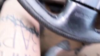 A horny girl masturbates and fucks the taxi driver in his car