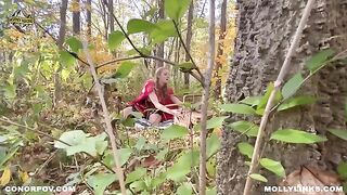 A little girl in a red riding hood costume is fucking with a big man in the forest