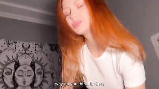 A red-haired girl clung to the man and started to suck him