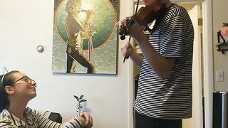 The couple was interrupted while trying to practice violin