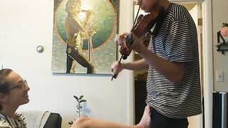 The couple was interrupted while trying to practice violin