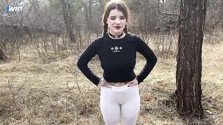 A pretty woman is fucking with a guy in the forest, it's quite a sight!