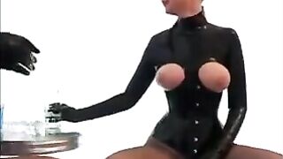 Two girls in latex suits couldn't resist their desire to fuck