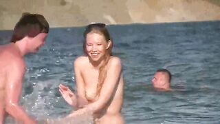 A hot woman is fucking on the nudist beach