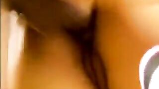 An Asian beauty was fucked by two guys at her home