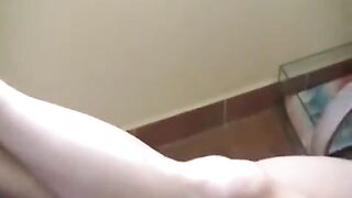 A drunk girl was smoking naked on the sofa