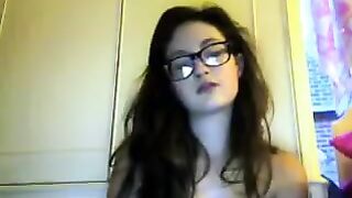 A cute student with glasses gets naked on webcam