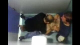 The camera hidden in the toilet shows how two guys are sucking cocks