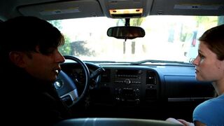 A sexy girl makes a blowjob to her friend driving a car