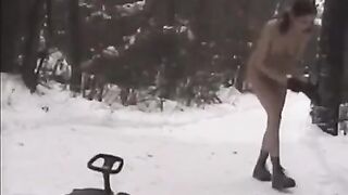 Nude girls are throwing snowballs at each other on the city streets