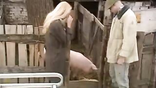 A Russian girl has sex with a guy in the village outdoors