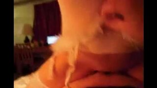 The wife, dressed as Snow Maiden, playfully awakens her husband with a kiss