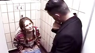 Babe fucked in the toilet booth of a night club