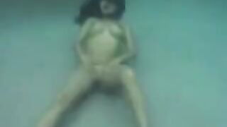 Sex in the ocean with busty brunette, a steamy underwater encounter