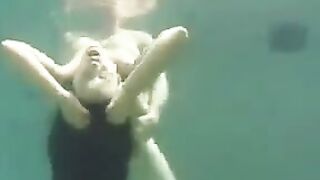 Sex in the ocean with busty brunette, a steamy underwater encounter