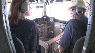 A hot stewardess is engaged in passionate sex