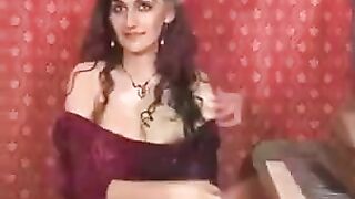 A hot brunette plays with her hairy pussy using a finger