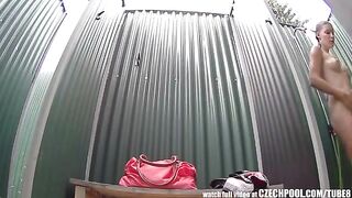 A girl washed herself in the shower, not knowing there was a camera