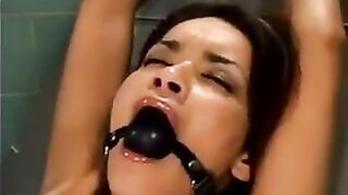 Bald guy fucked a girl with a machine for sex in BDSM