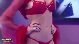 A sexy girl is modeling different types of underwear on a catwalk
