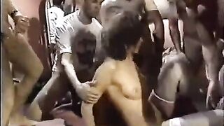 A young slut threw herself into the circle of eager guys