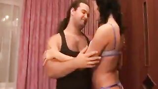 A gymnast has sex in an interesting pose, showcasing flexibility and passion