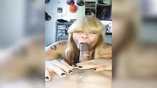 Black beauty gets her mouth filled with a big cock in a condom