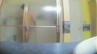 A girl took a shower, not knowing there was a spy camera