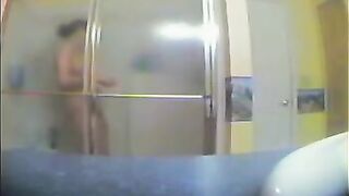 A girl took a shower, not knowing there was a spy camera