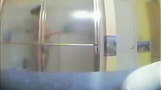 A girl took a shower, not knowing there was a spy camera