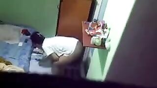 Spy camera in the room of a girl in the hostel